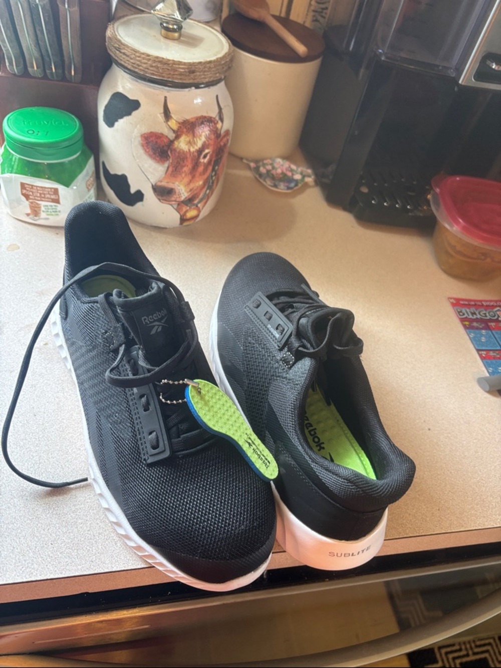 Reebok Black steeled toe non slip Sneakers with Lime Green Insoles